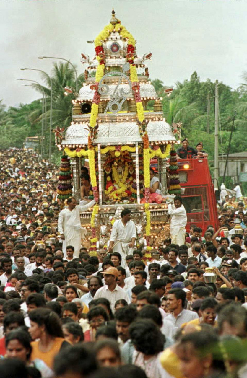 Thousands of Hindu devotees follow the silver chariot carrying the statue of the Hindu deity, Lord Murugan on the eve of the annual Hindu festival of Thaipusam in Kuala Lumpur on February 3, 1996. – AFP pic