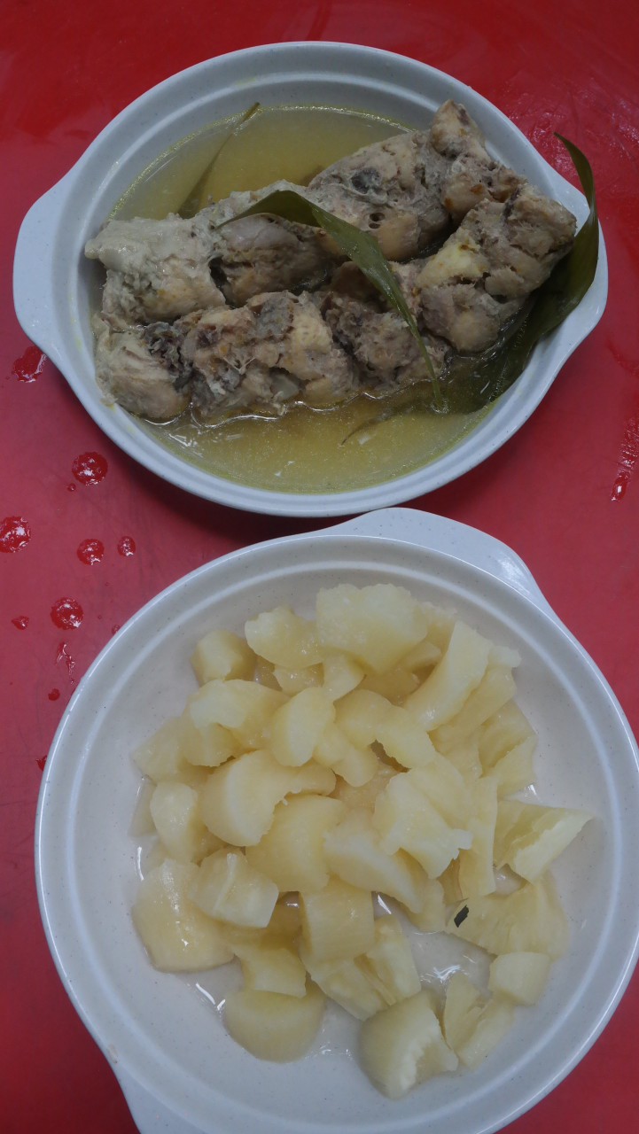 (Above) Ayam masak dalam buluh, (below) ubi kikir. Traditional Orang Asli dishes. – Pic courtesy of Syarifah Nadhirah