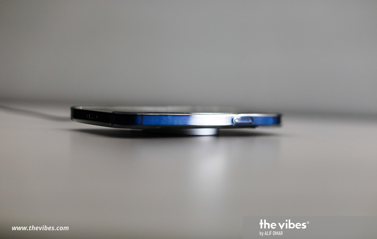 The iPhone 12 getting charged via the MagSafe charger ‘puck’. – The Vibes pic/Alif Omar