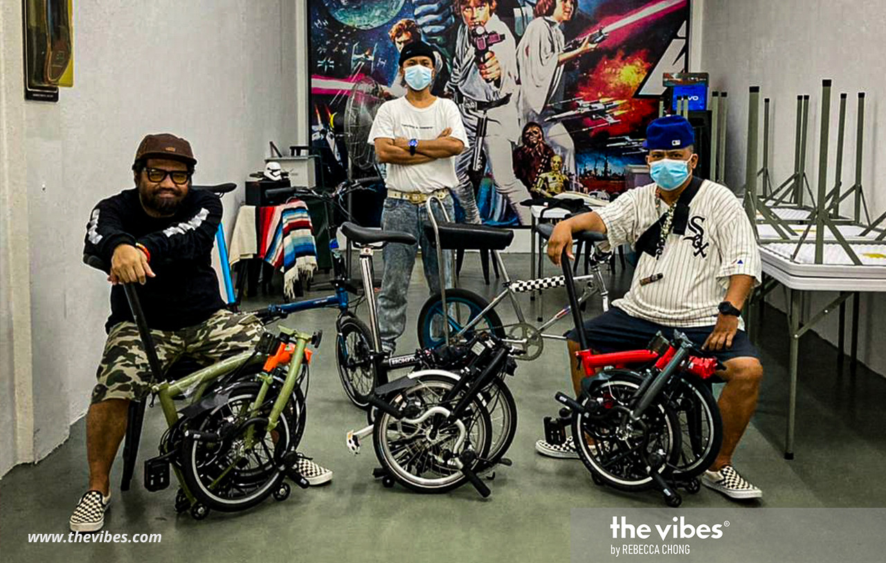 Borhan Rustam (C) with his bike that he bought for RM12,000 from the UK, and his brother Jupridin Rustam (R). - The Vibes pic/Rebecca Chong