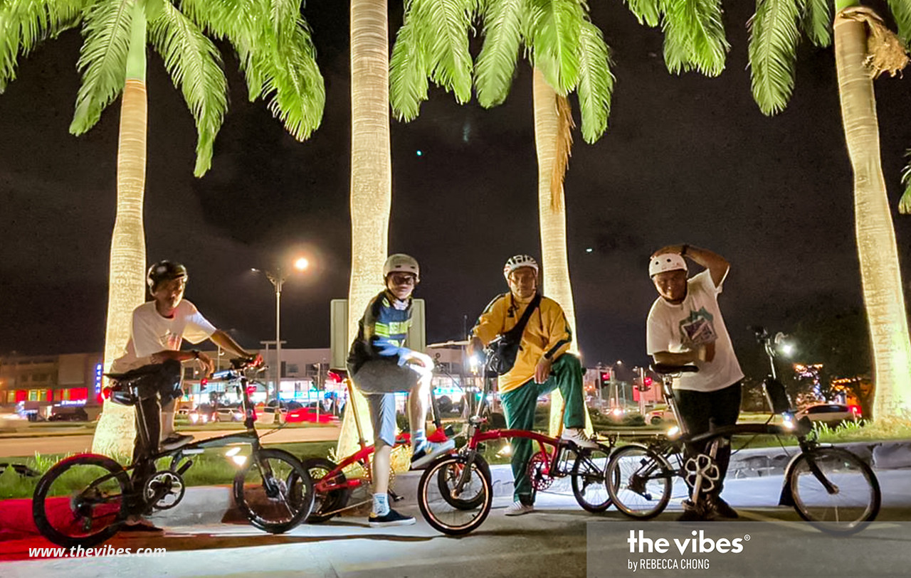 Jupridin Rustam (2nd from R) thinks that a folding bike is fashionable as it is connected to the streetwear style. - The Vibes pic/Rebecca Chong 
