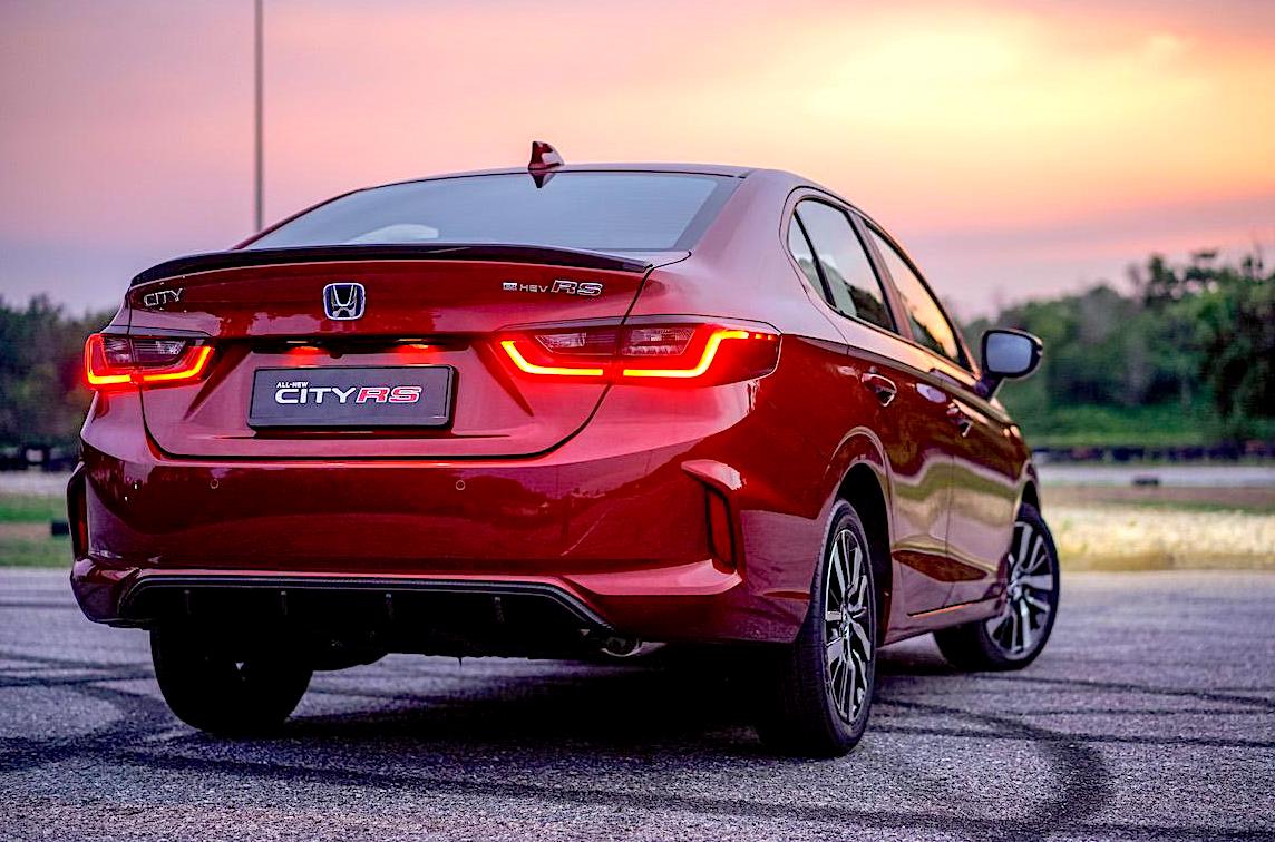 New Rear Bumper with Diffuser, New Gloss Black Trunk Spoiler and New Gloss Black Door Mirrors to give a sporty two-toned impression of the body colour. – Pic courtesy of Honda Malaysia
