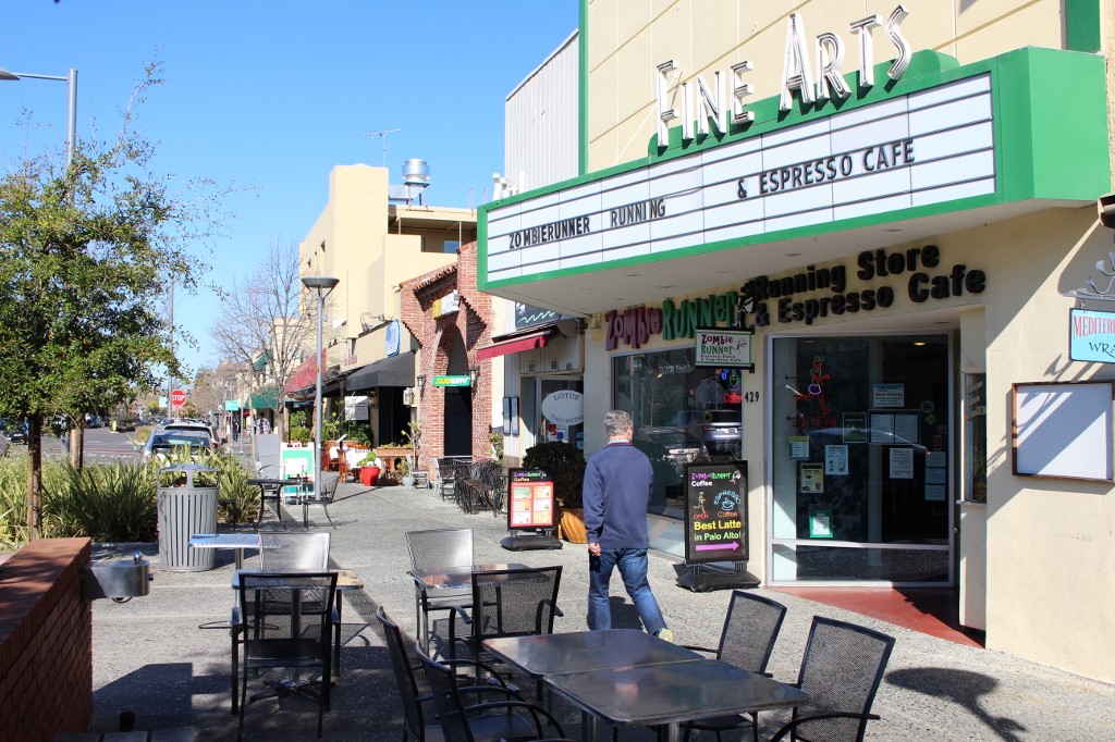 A man glances into ZombieRunner coffee shop as he strides along a quiet sidewalk in downtown Palo Alto on March 12. – AFP pic, September 19, 2020