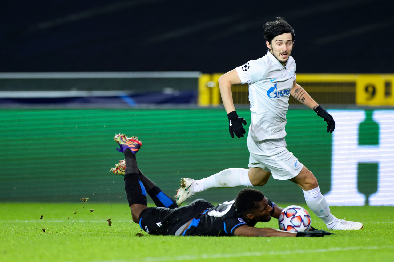 Zenit St. Petersburg's Iranian forward, Sardar Azmoun (right), seen here fighting for the ball with Club Brugge's Angolan defender, Clinton Mata, during the UEFA Champions League Group F football match in 2020