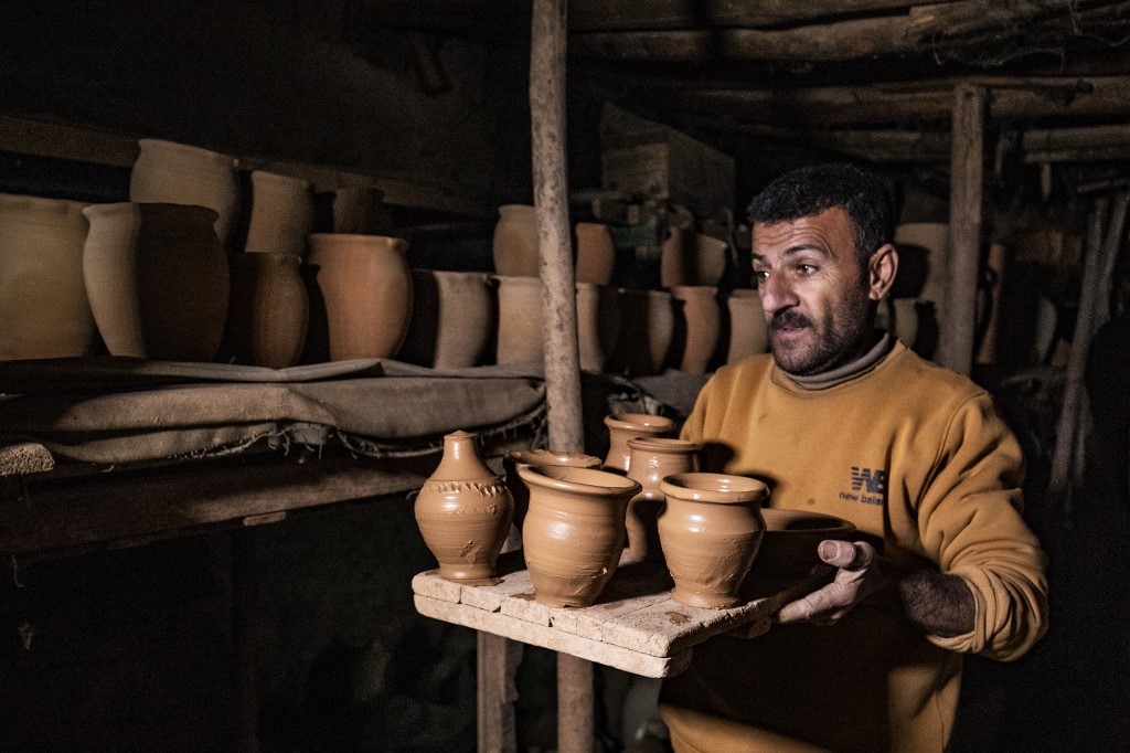 Petros was only a teenager when he had to take over for his sick father and become the main potter of the family. – AFP pic