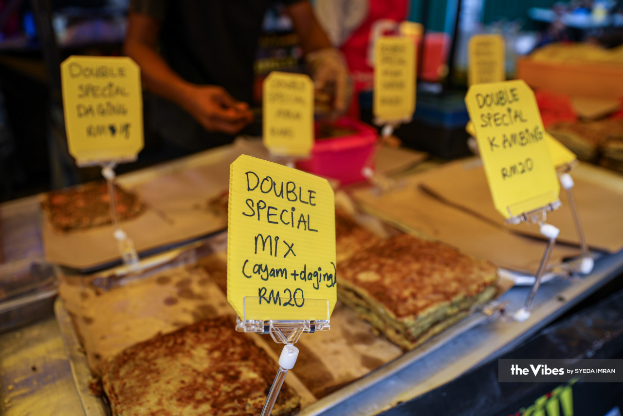 Omar Ahmad (not pictured), a murtabak seller, says that he added just RM1 to last year’s price so as not to deter buyers. – SYEDA IMRAN/The Vibes pic, April 12, 2023