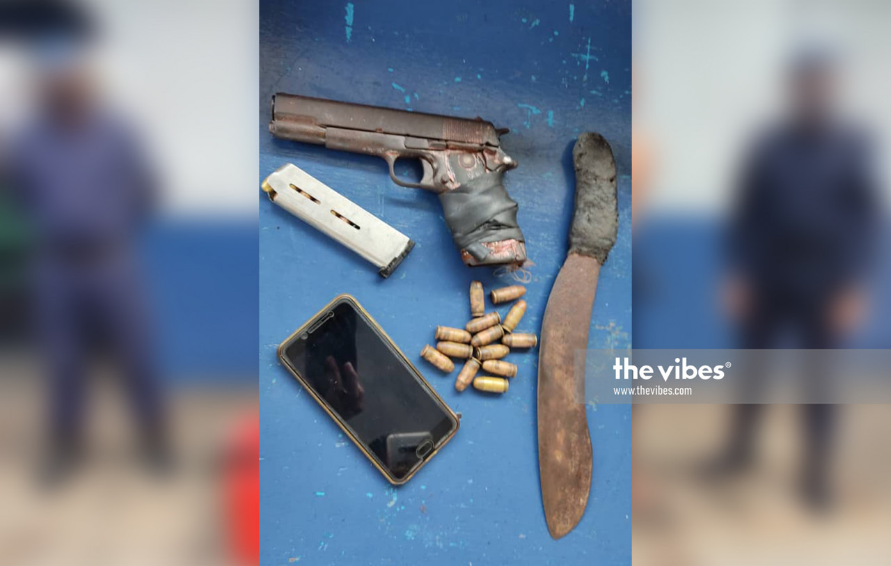 The suspects' pistol, 25 bullets, a mobile phone, and machete. – The Vibes pic, December 6, 2020