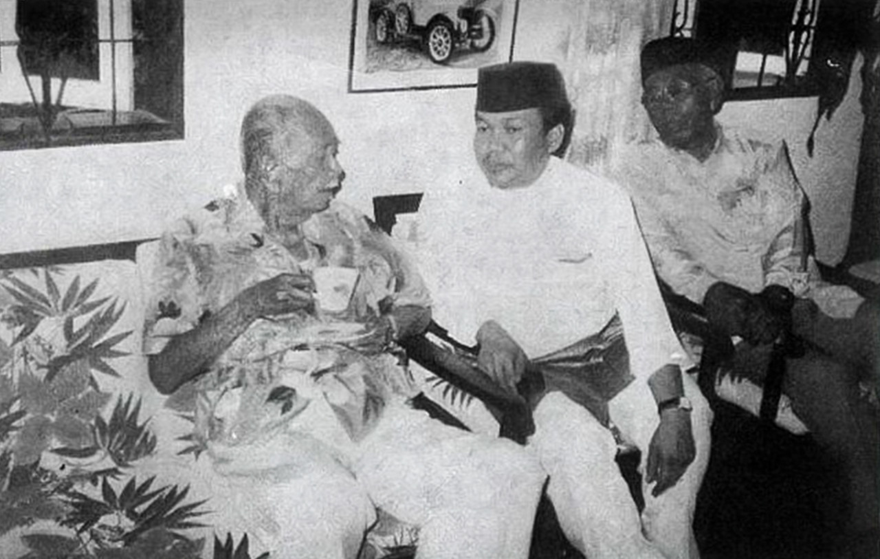 Tok Him with the first prime minister of Malaysia, Tunku Abdul Rahman Putra, at his house in Taman Melawati, Kuala Lumpur. – Pic courtesy of 'The Misunderstood Man: An Untold Story' by Ibrahim Ali