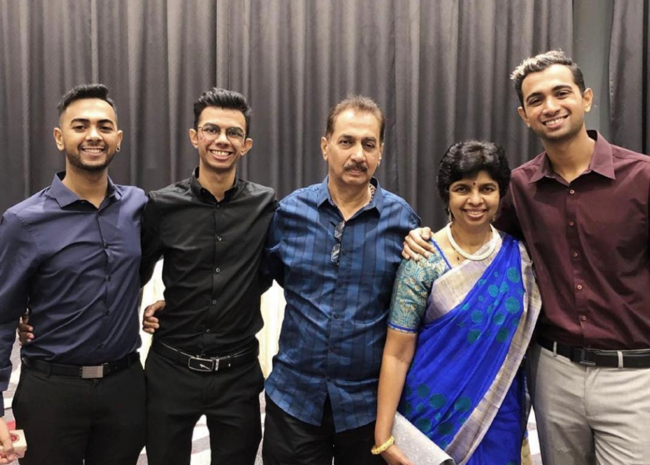 T.V. (far right) pictured together with his family. Despite low-key celebrations this year, they plan to share the festivities by sending food to loved ones instead of inviting people over. – Pic courtesy of Thevanesh Rao S.Prabaker, November 13, 2020.