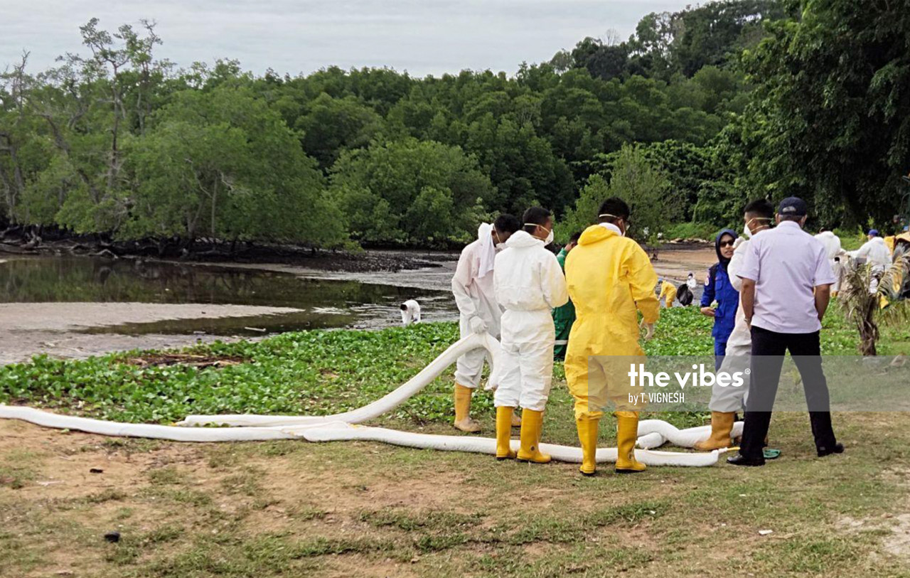 Pantai Cermin clean-up involves 83 people from 10 agencies as the oil spill stretches around 2km. – The Vibes pic, October 15, 2020