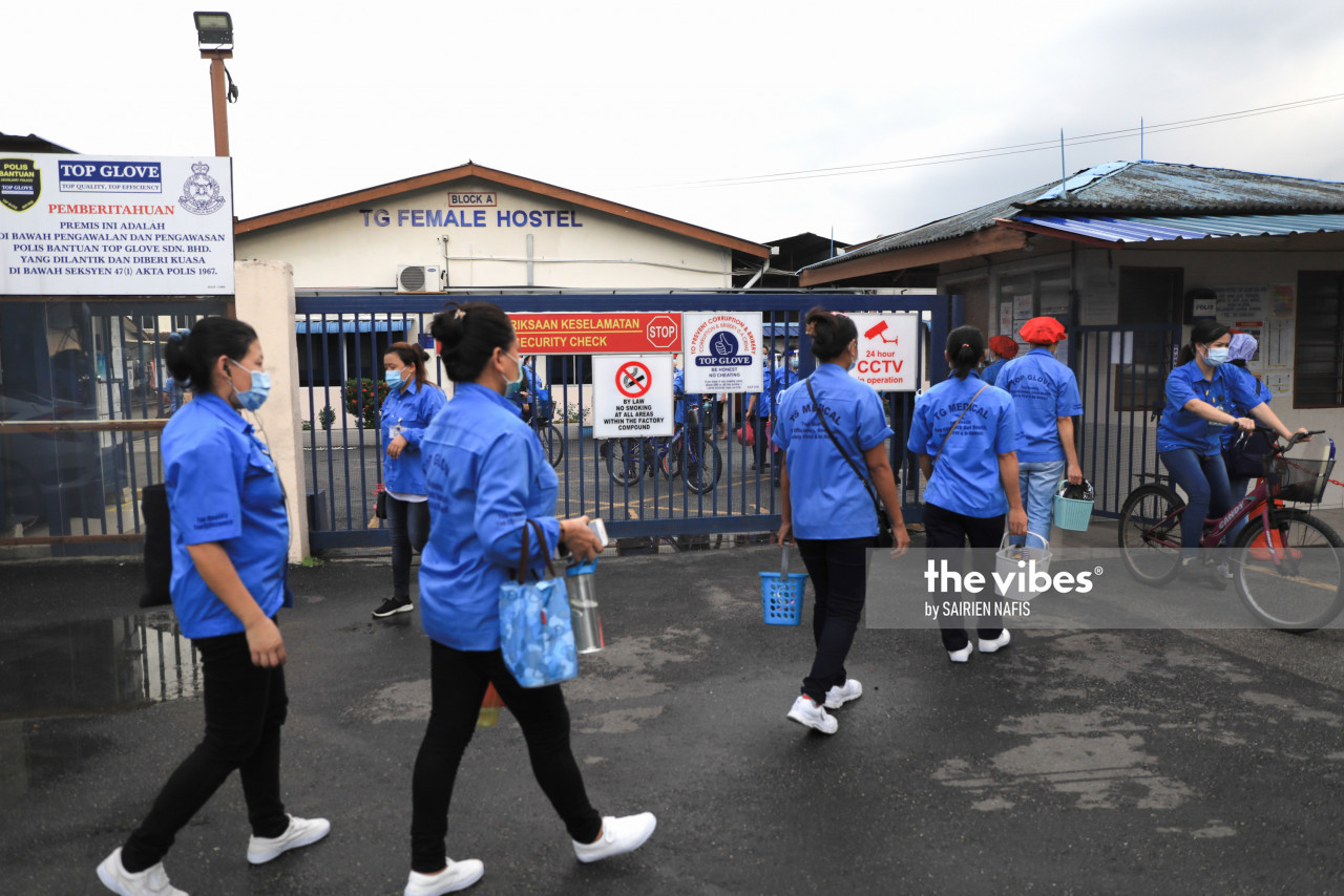 Top Glove workers entering the female hostel