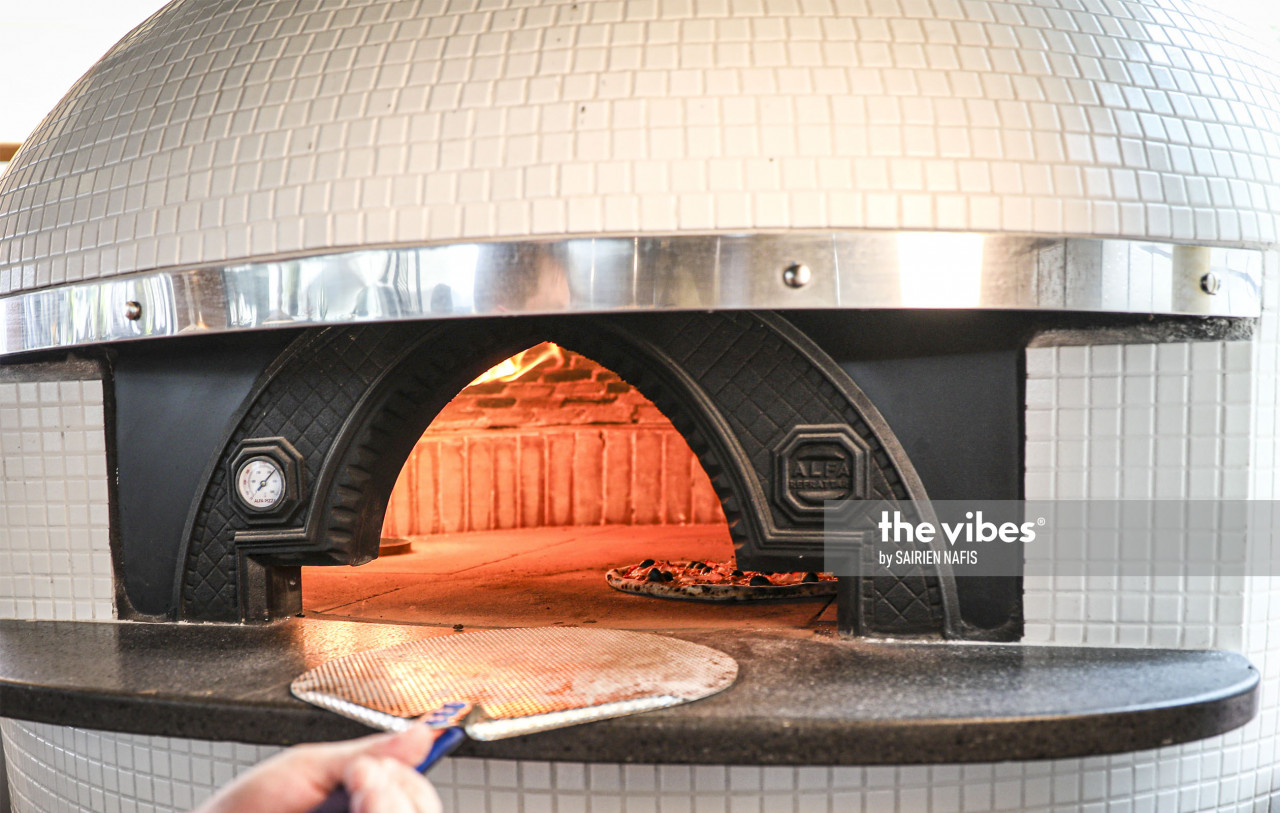 The Alfa Forni wood and gas fired oven, located in the outdoor eating area. Imported from Italy, the oven is a centrepiece of the dining experience at Roberto's. – The Vibes pic