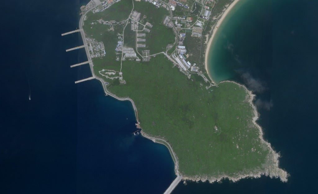This August 18 image courtesy of Planet Labs reportedly shows a China submarine (centre, bottom) entering an underground base on Hainan island. The satellite image appears to show a Type 093 nuclear-powered attack submarine entering a tunnel on Yulin naval base. – AFP pic. September 19, 2020 