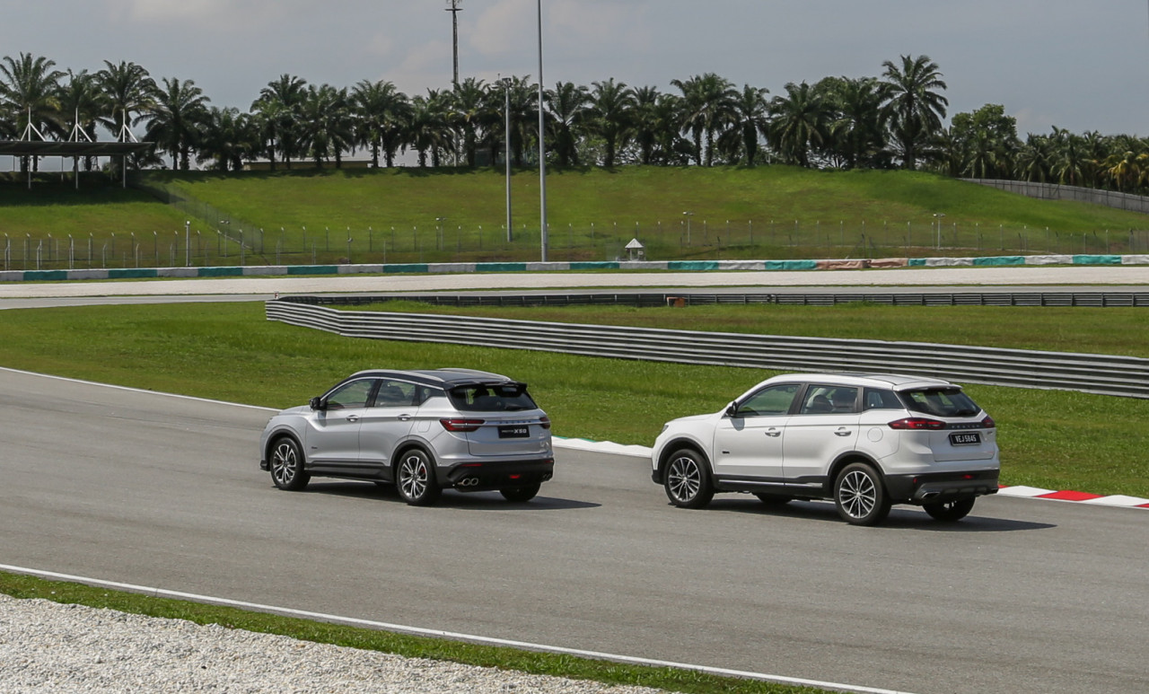 Proton X50 Crossovers race along the circuit during last year's media preview event. – Pic courtesy of Proton Cars