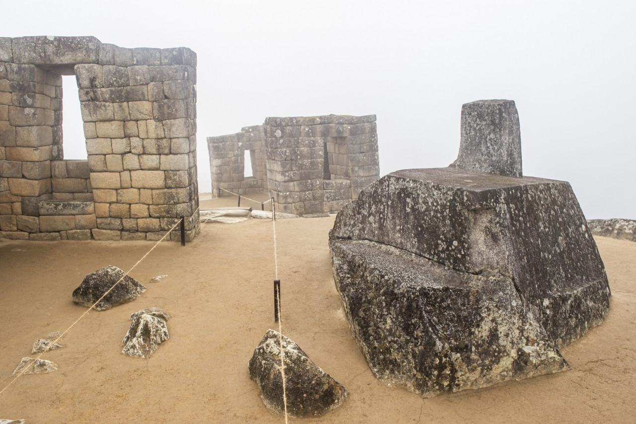 View of the Intihuatana (tie up the sun in quechua) stone, used by Inca priests for astronomical observations, at the archaeological site of Machu Picchu, in Cusco, Peru on November 02, 2020. – AFP, November 3, 2020