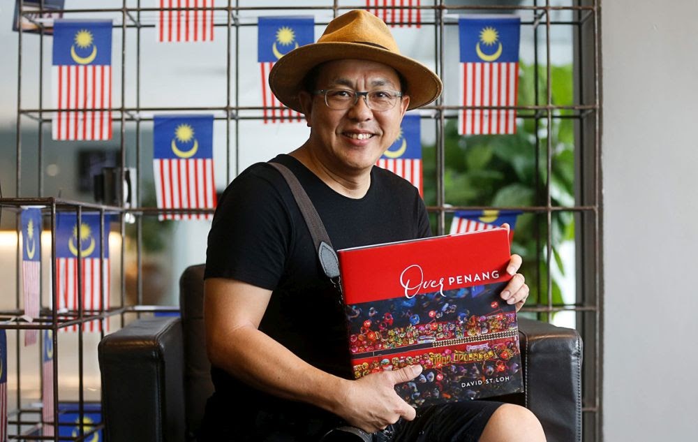 David ST Loh with the Malaysian National Book Awards 2020, English (adult) category winner 'Over Penang'. – Pic courtesy of David ST Loh, December 7, 2020  