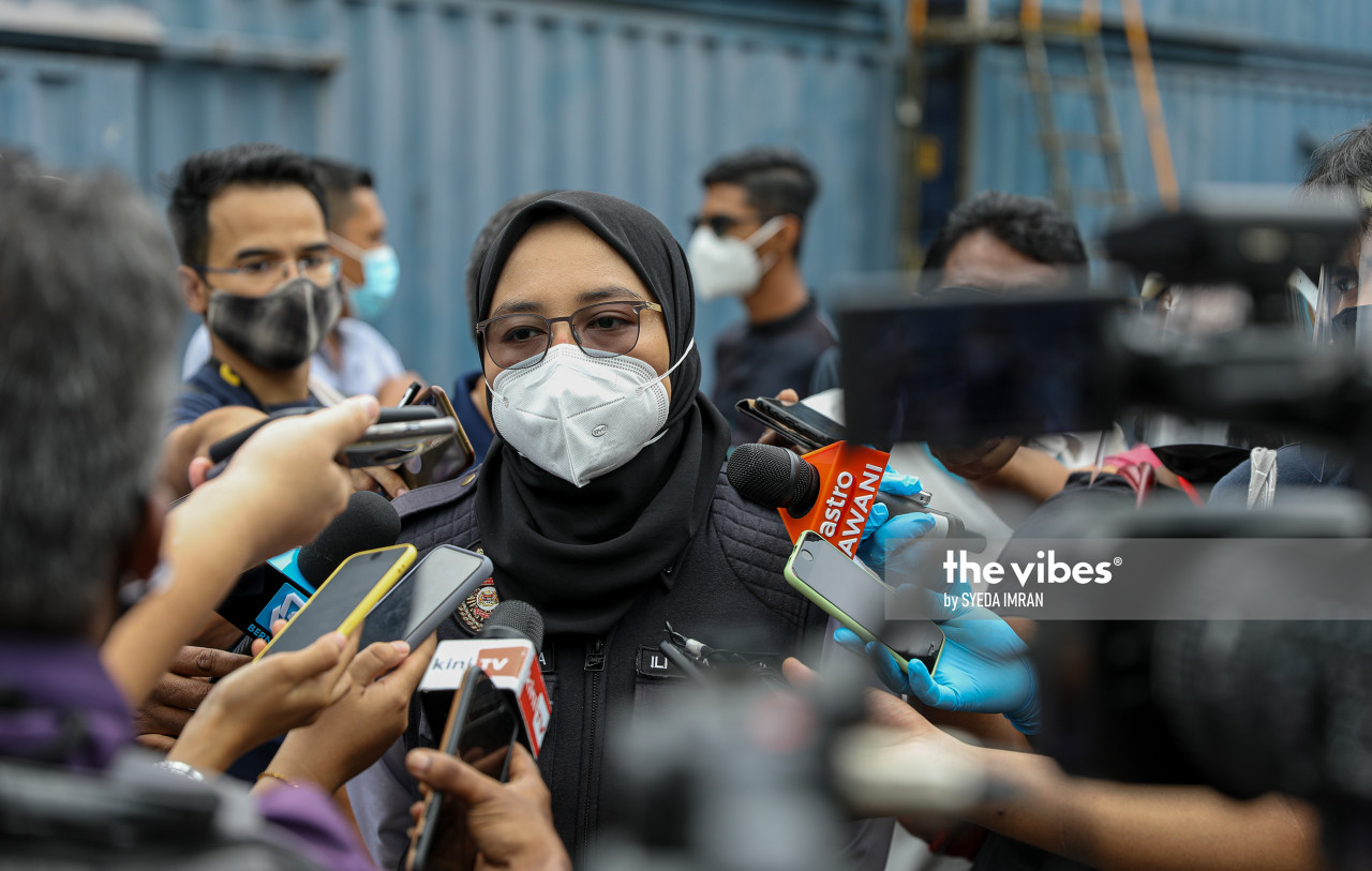 Klang Health Department health and hygiene inspector Ili Syazwani Mohd Mashudi is awaiting a report from her team on whether a glove factory in Port Klang will have to shutter, or just its worker dorms. – SYEDA IMRAN/The Vibes pic, December 26, 2020