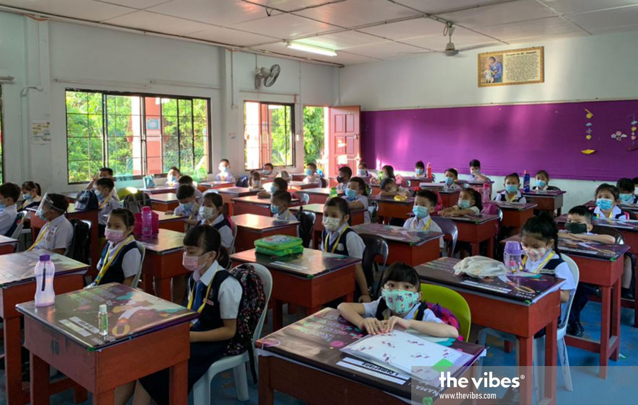 Students observing physical distancing in the classroom at a school in Penampang. – The Vibes pic, March 1, 2021