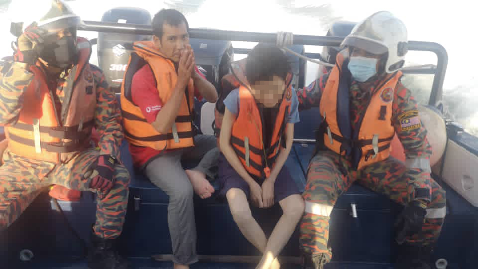The husband, who jumped off the Penang Bridge after his wife (right) to save her. – Penang Fire and Rescue Department pic, April 16, 2021