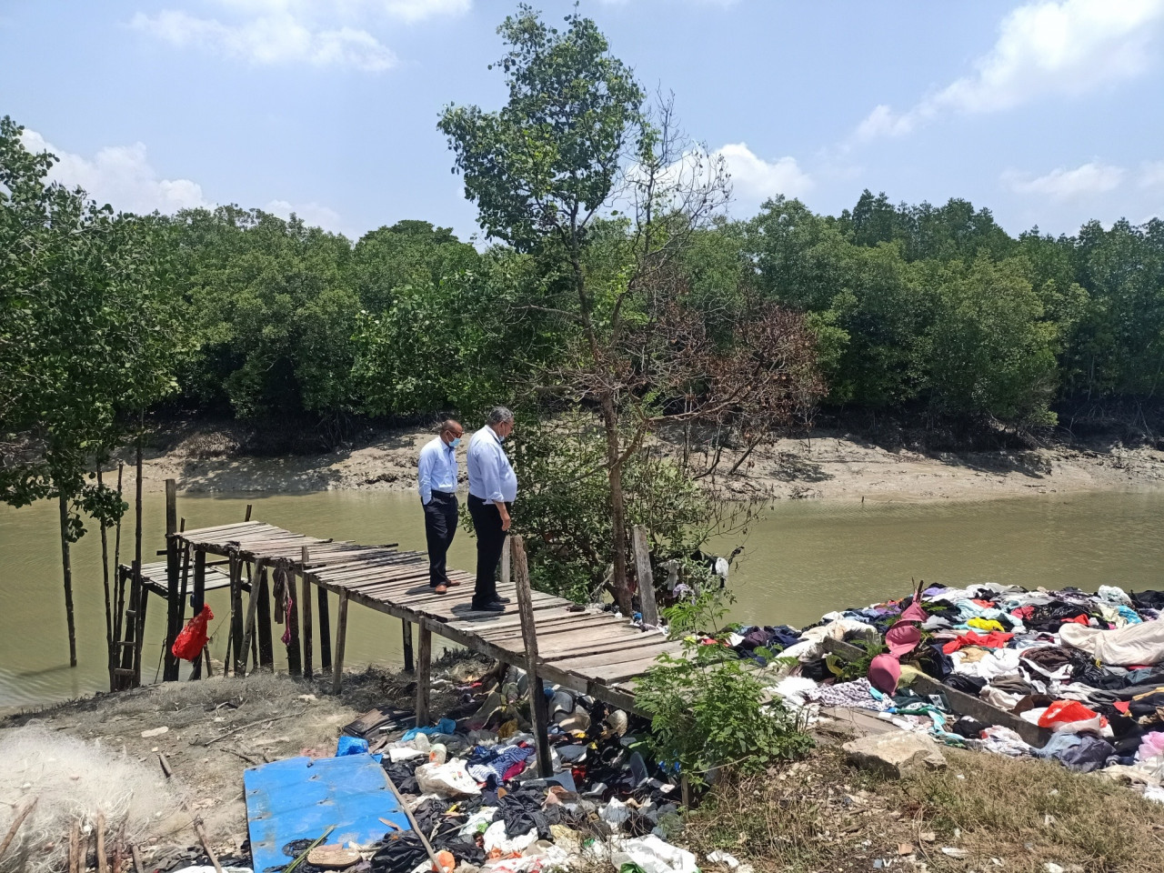 A jetty that services the Pulau Indah Orang Asli settlement seen used as a dumping ground for used clothes. – jakoa.gov.my pic, July 20, 2021