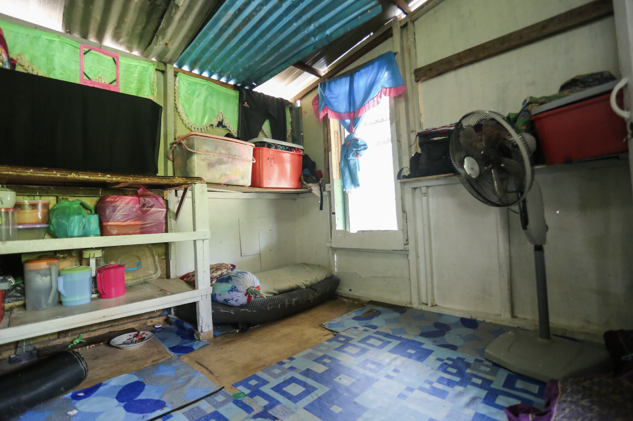 Liana, a 27-year-old undocumented housewife, says she could not leave the village to go to the clinic for a monthly pregnancy check-up, as she could not afford to pay for the bus and medical fees. – Pic courtesy of Ahmad Jimmy, February 2, 2022