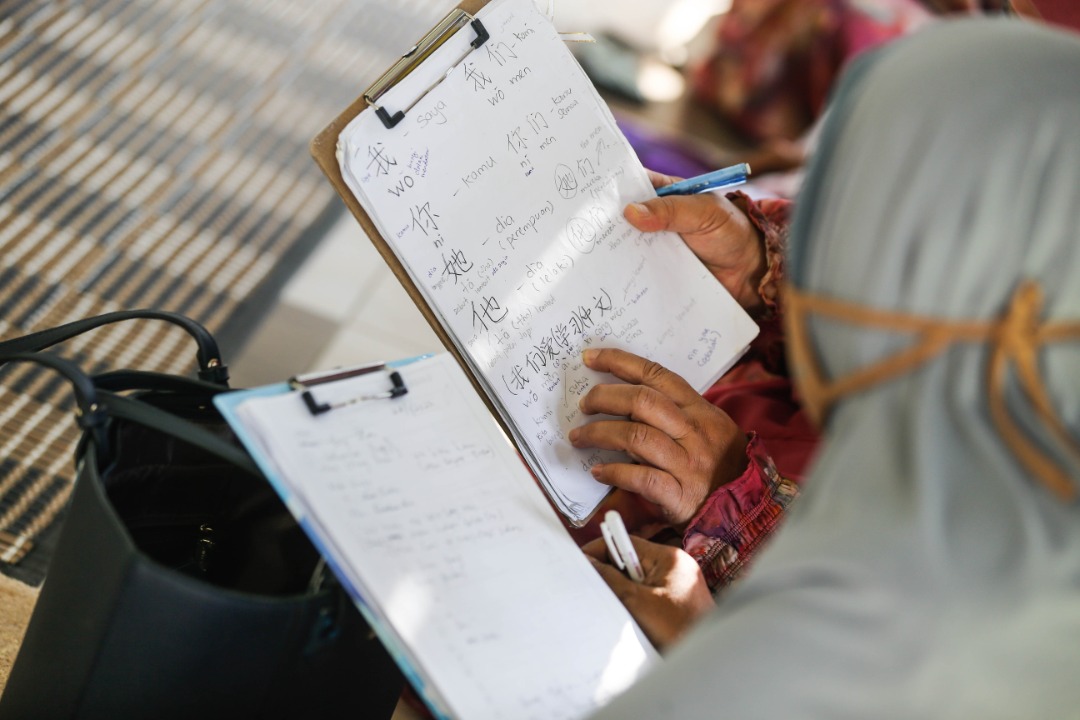 Former teacher Ropia’ah Othman, 62, says that currently she only teaches words and phrases, as well as how to construct sentences and practise basic diction correctly. – SOFIA NASIR/The Vibes pic, February 1, 2022