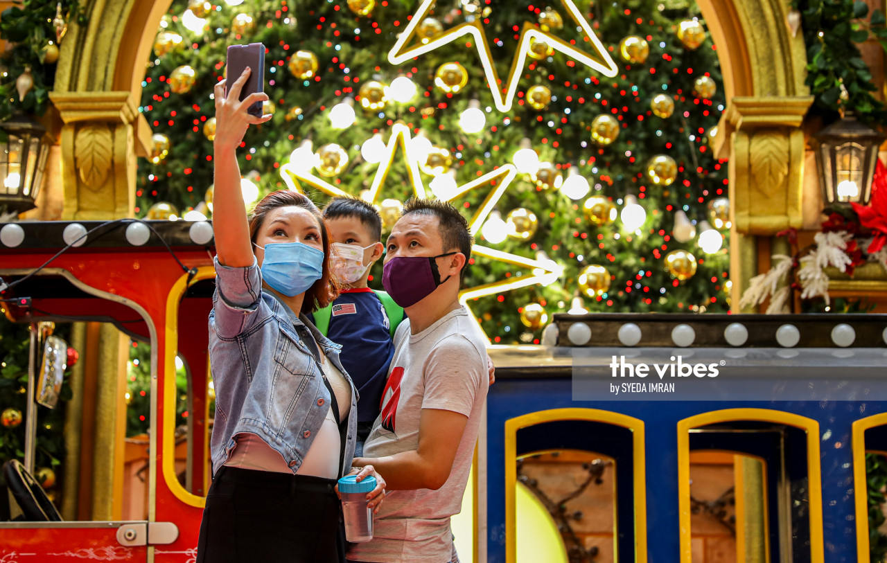 Malaysians from all walks of life cannot help but admire, and take photos with, Christmas lights and decor. – The Vibes pic, December 25, 2020
