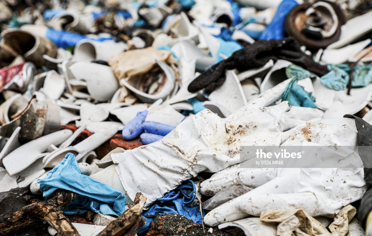 Rejected rubber gloves and broken glove moulds seen at a factory in Port Klang. – The Vibes pic, December 26, 2020