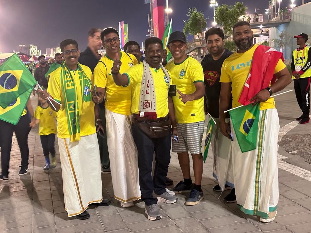 A Malaysian visitor (far right) in Qatar brought a Pakatan Harapan (PH) flag to Lusail Stadium in Lusail for the Group G match between Brazil and Serbia. - Social media pic, November 25, 2022