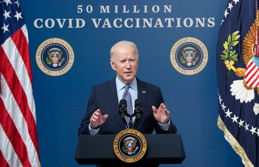 US President Joe Biden speaks about the 50 million doses of the Covid-19 vaccine shot administered in the US during an event commemorating the milestone in the Eisenhower Executive Office Building in Washington, DC, yesterday. – AFP pic, February 26, 2021