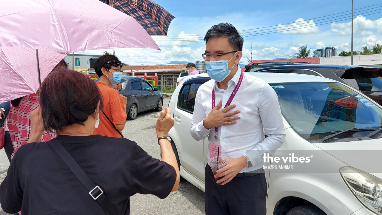DAP’s Luyang candidate Ginger Phoong (right) greeting voters at Peak Nam Tong voting centre. – The Vibes pic, September 26, 2020