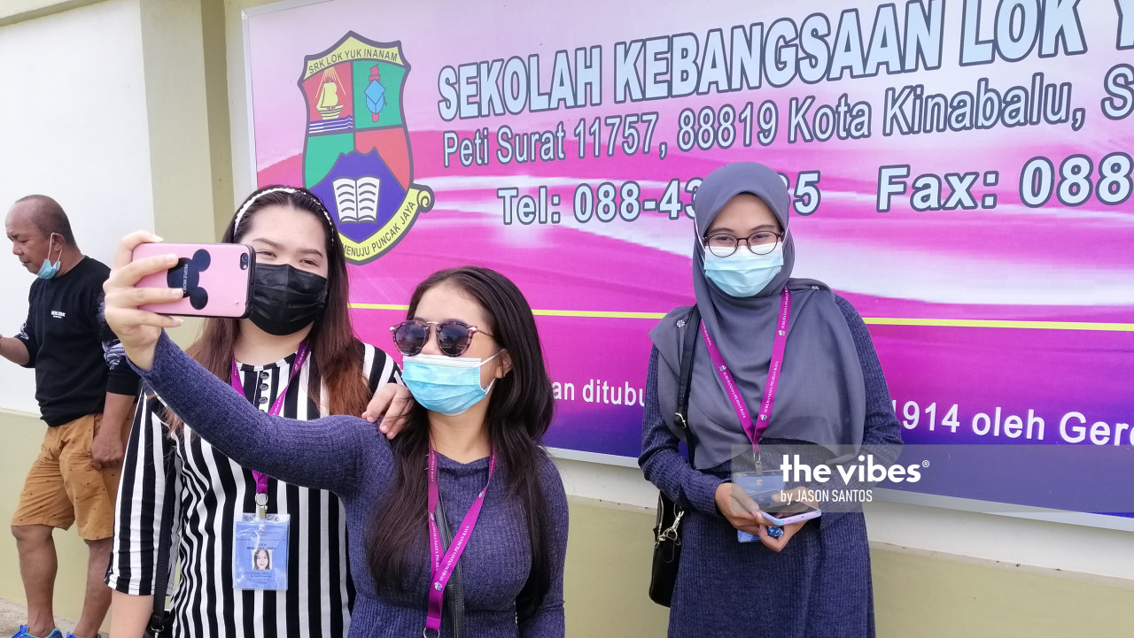 There is always time for a selfie as three women took theirs after voting at SK Lok Yuk, Inanam. – The Vibes pic, September 26, 2020
