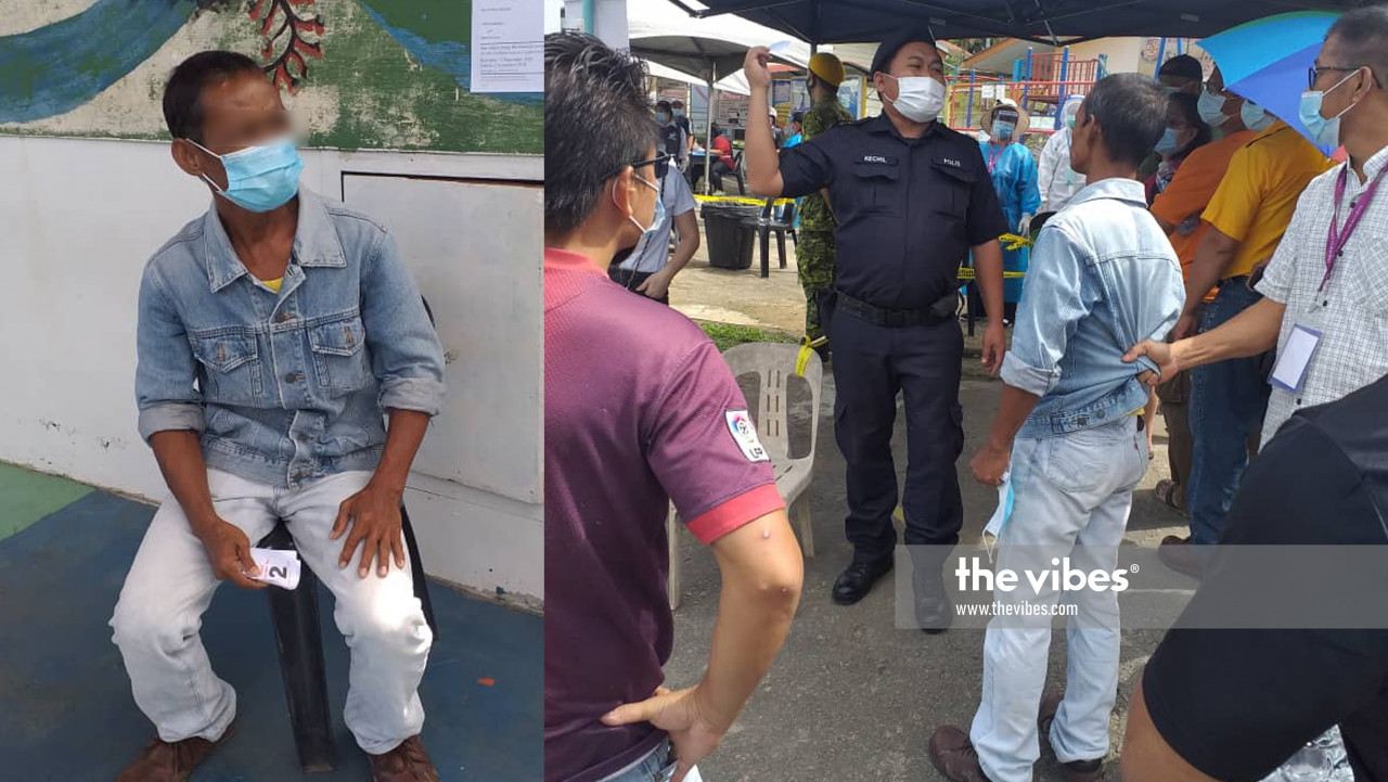 A suspected illegal immigrant is detained after trying to cast his ballot. – The Vibes pic, September 26, 2020