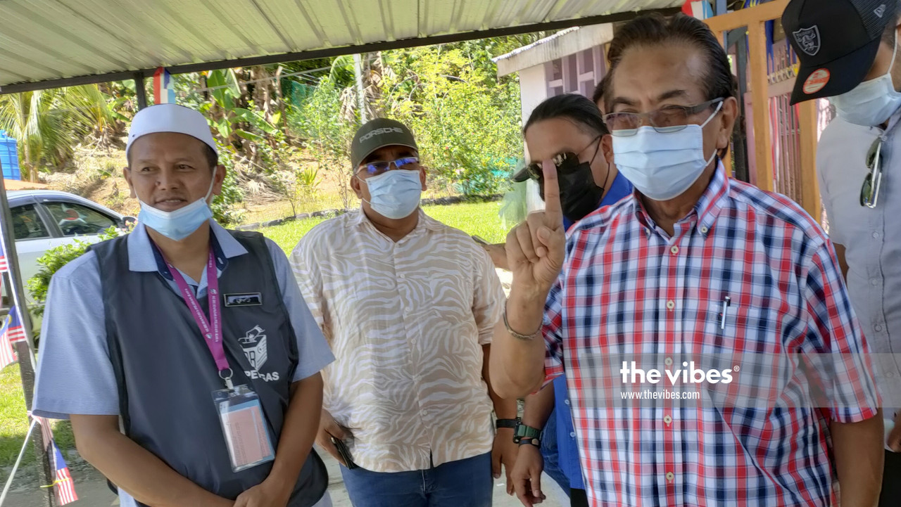 Former CM Tan Sri Musa Aman (right) left the polling station after voting. – The Vibes pic, September 26, 2020
