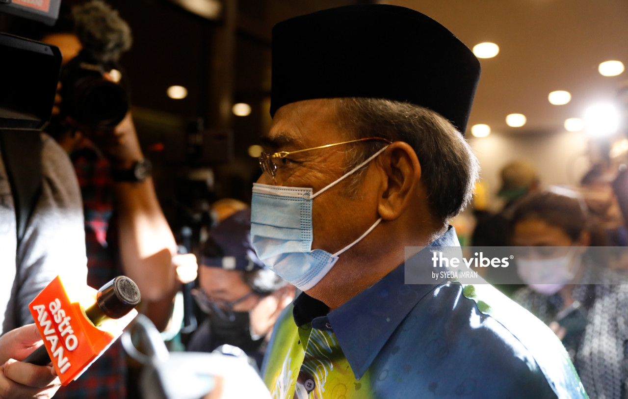 Umno Supreme Council member Datuk Seri Tajuddin Abdul Rahman making his way past media personnel at the lobby. – The Vibes pic, October 28, 2020