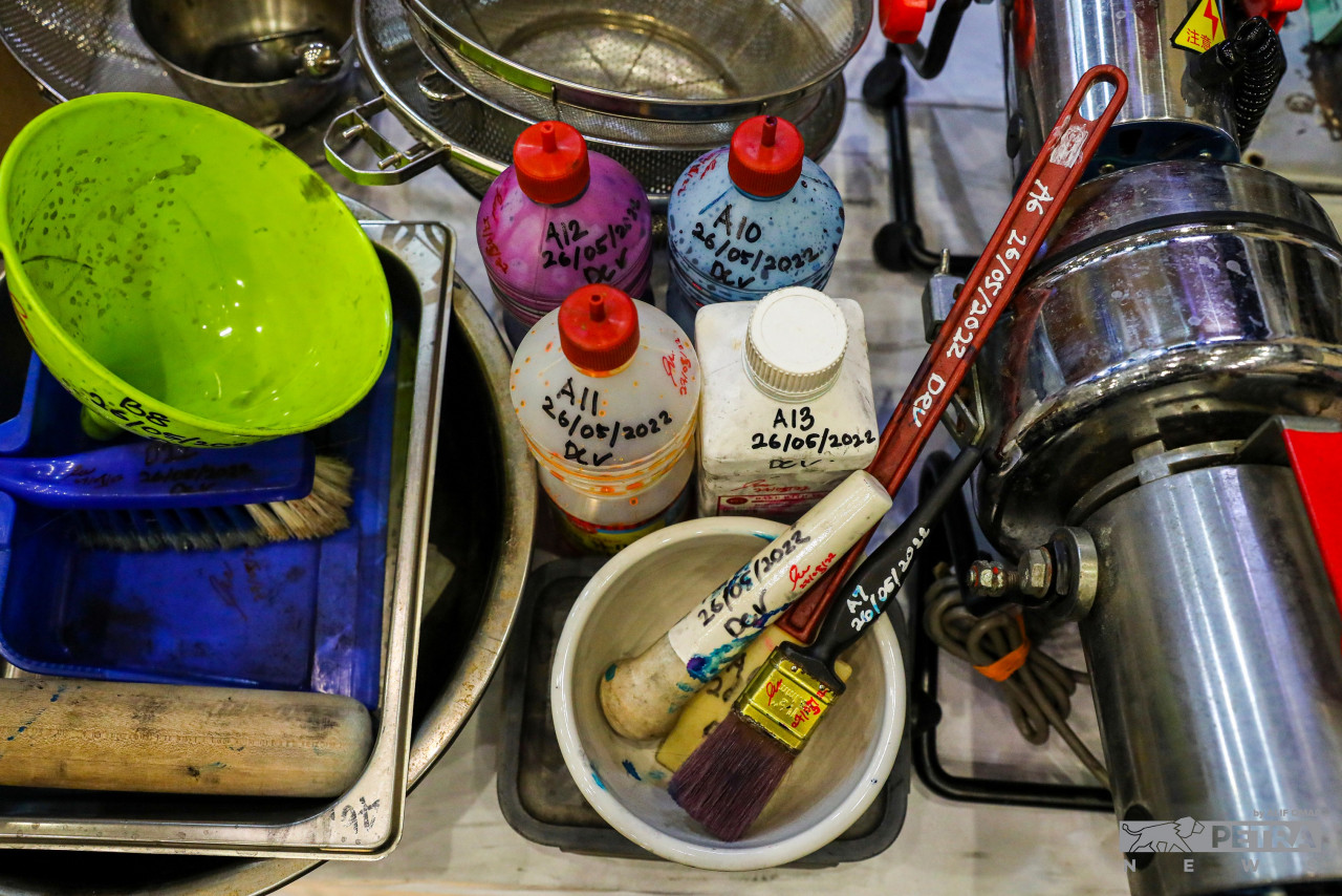 Drug-making paraphernalia on display as part of the confiscated evidence. – ALIF OMAR/The Vibes pic, May 29, 2022