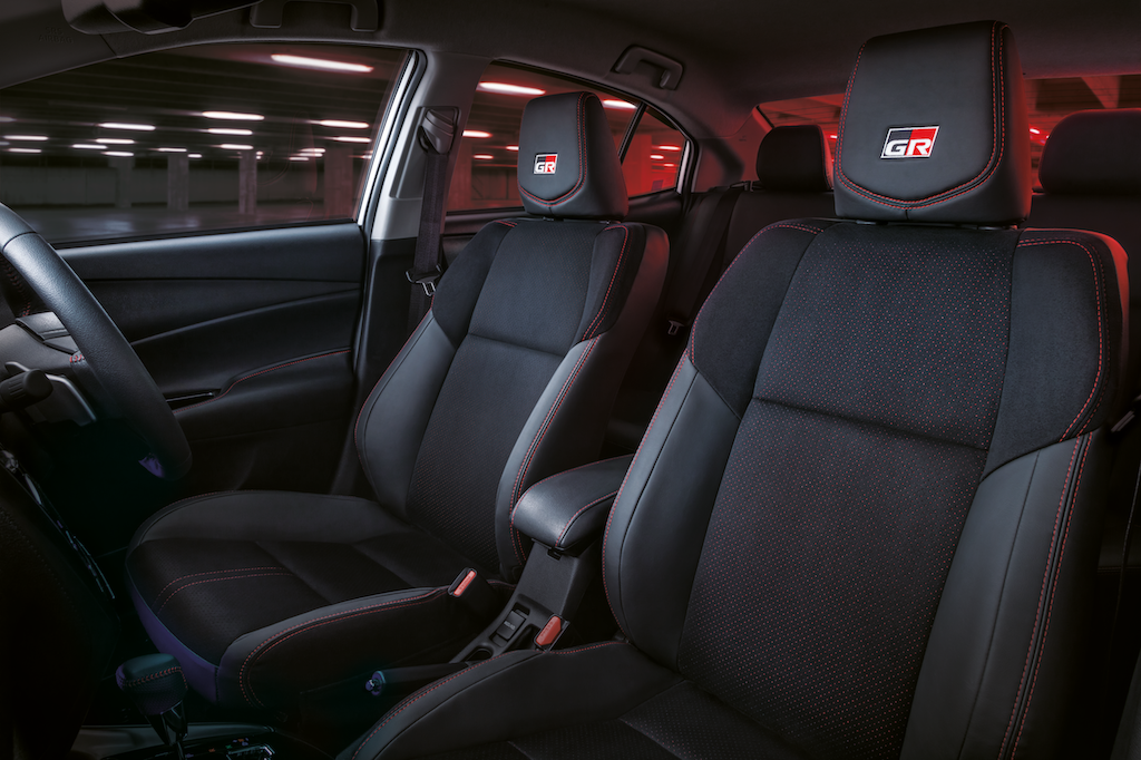 Black with red stitching suede and leather wrapped sports seats. – PIc courtesy of UMW Toyota