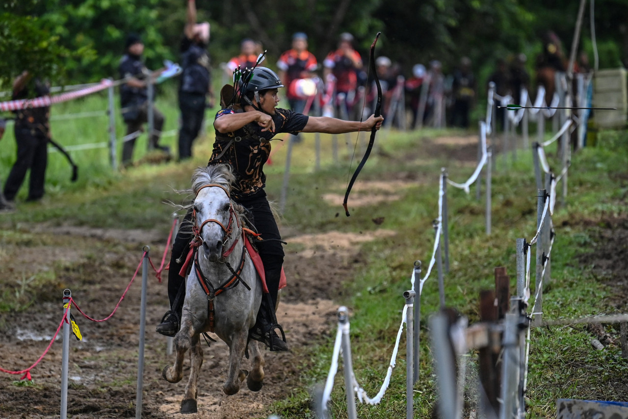 A participant (pictured above) taking part in a Horseback Archery League competition at Cape Cavallho Equestrian Club in Rembau on November 13. – AFP pic, November 29, 2021