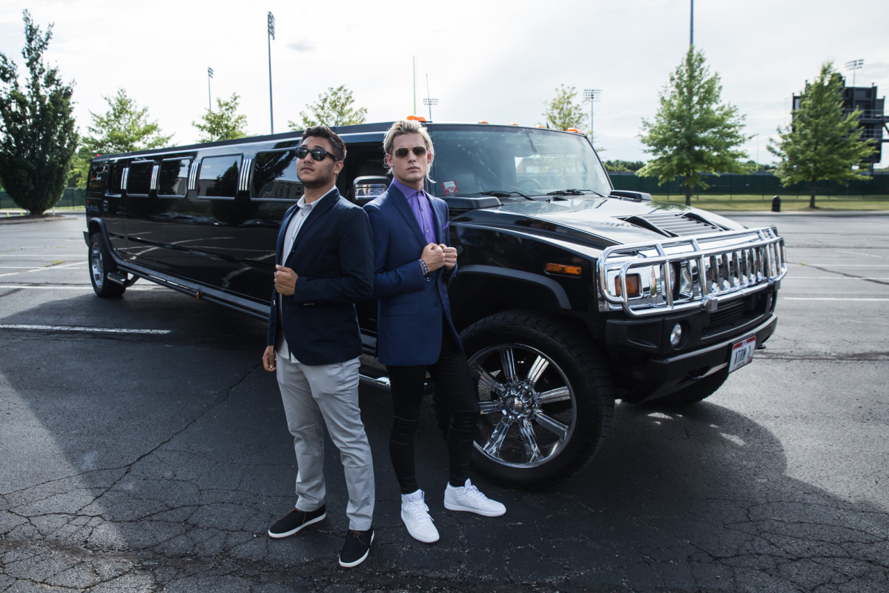Tour Manager Nadeem A. Salam and American rock group I See Stars vocalist Devin Oliver stand in front of a strech Hummer limousine before attending The Alternative Press Music Awards in this undated photo. – Pic courtesy of Skesh Entertainment, October 17, 2020