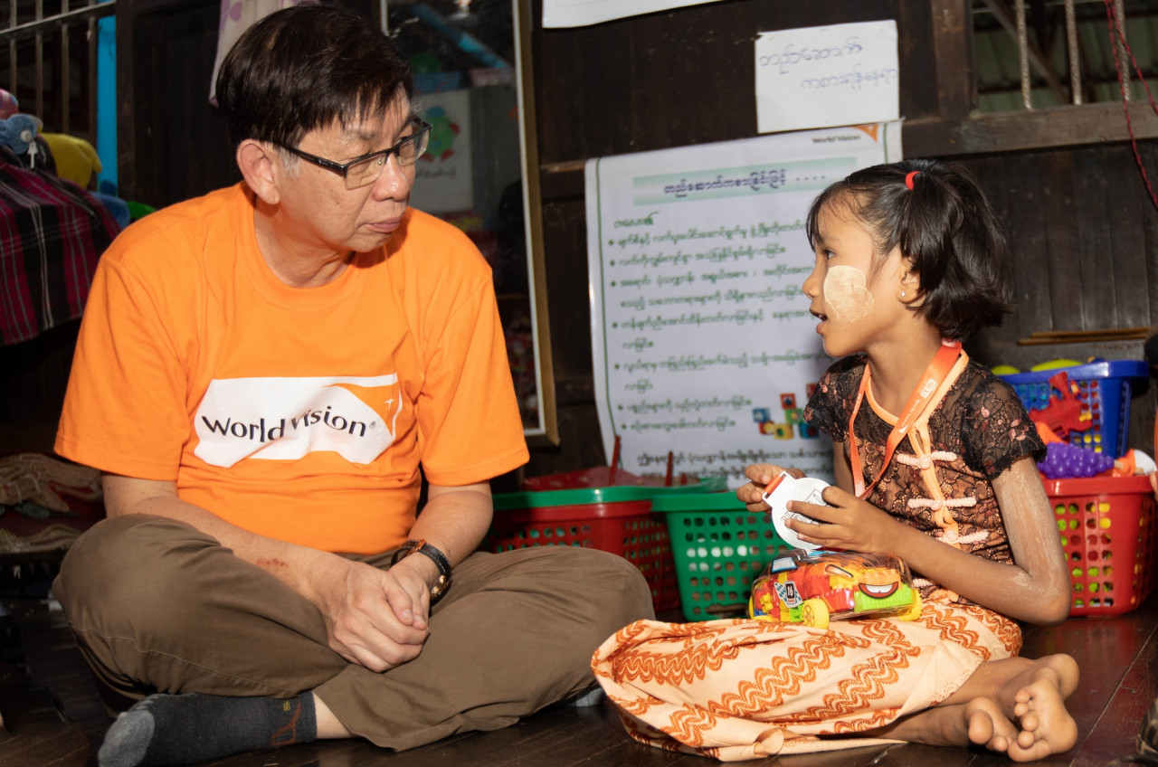 Boey meets with his sponsored child as part of the Child Sponsorship Programme. - Pic courtesy of WVM