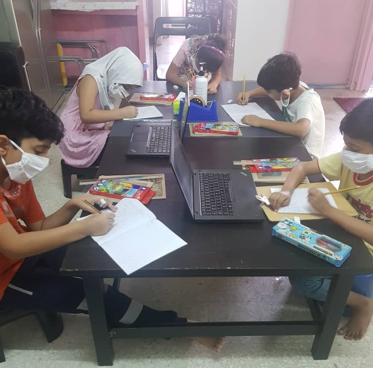 Students working hard on their classwork while adhering to SOPs. Home space at the respective centres is transformed into a make-shift home classroom. - Pic courtesy of Dignity