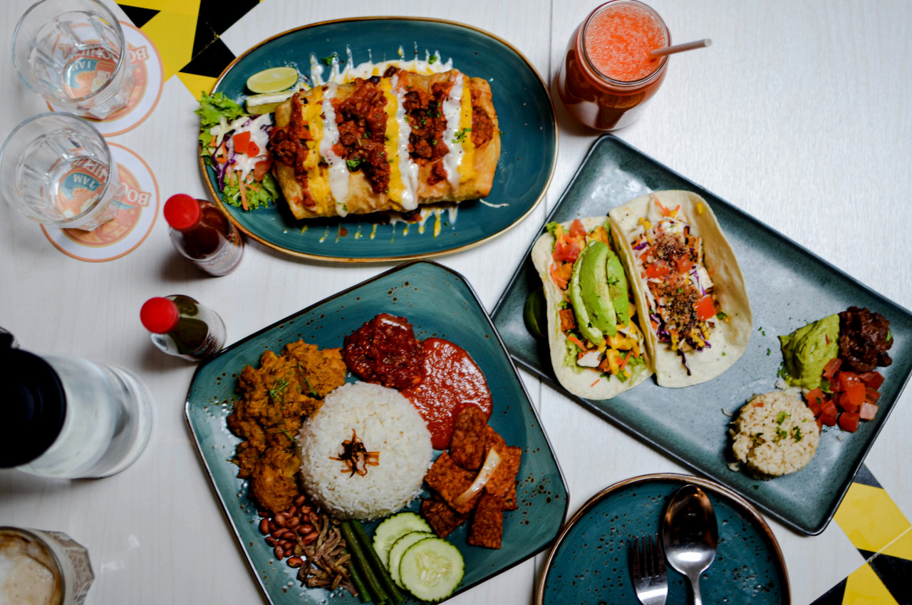 (Clockwise from above) Fried chimichanga with mushroom asada, protein-packed taco and spicy Asian tofu taco, nasi lemak served with spicy tempeh and mushroom ‘anchovies’. – Pic courtesy of Rahimee Wahab