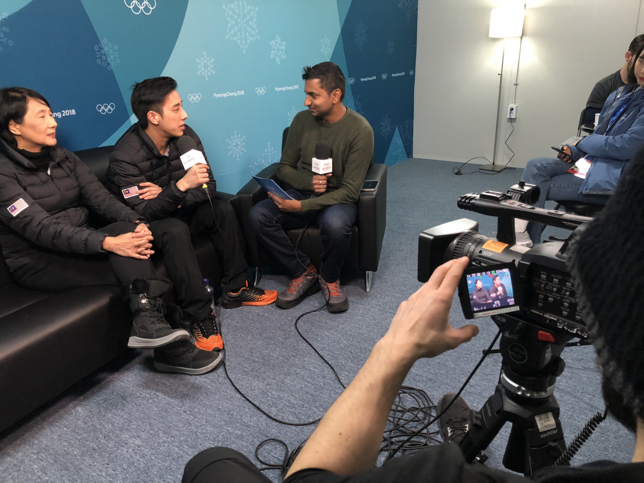 Sanjeev interviewing figure skater Julian Yee at PyeongChang. - Pic courtesy of Sanjeev Palar