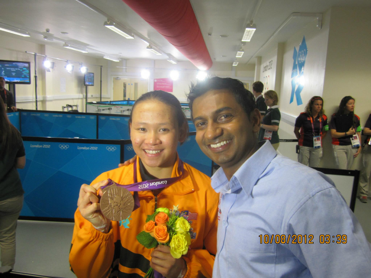 The writer with Pandelela Rinong after her historic win at the 2012 London Olympics
