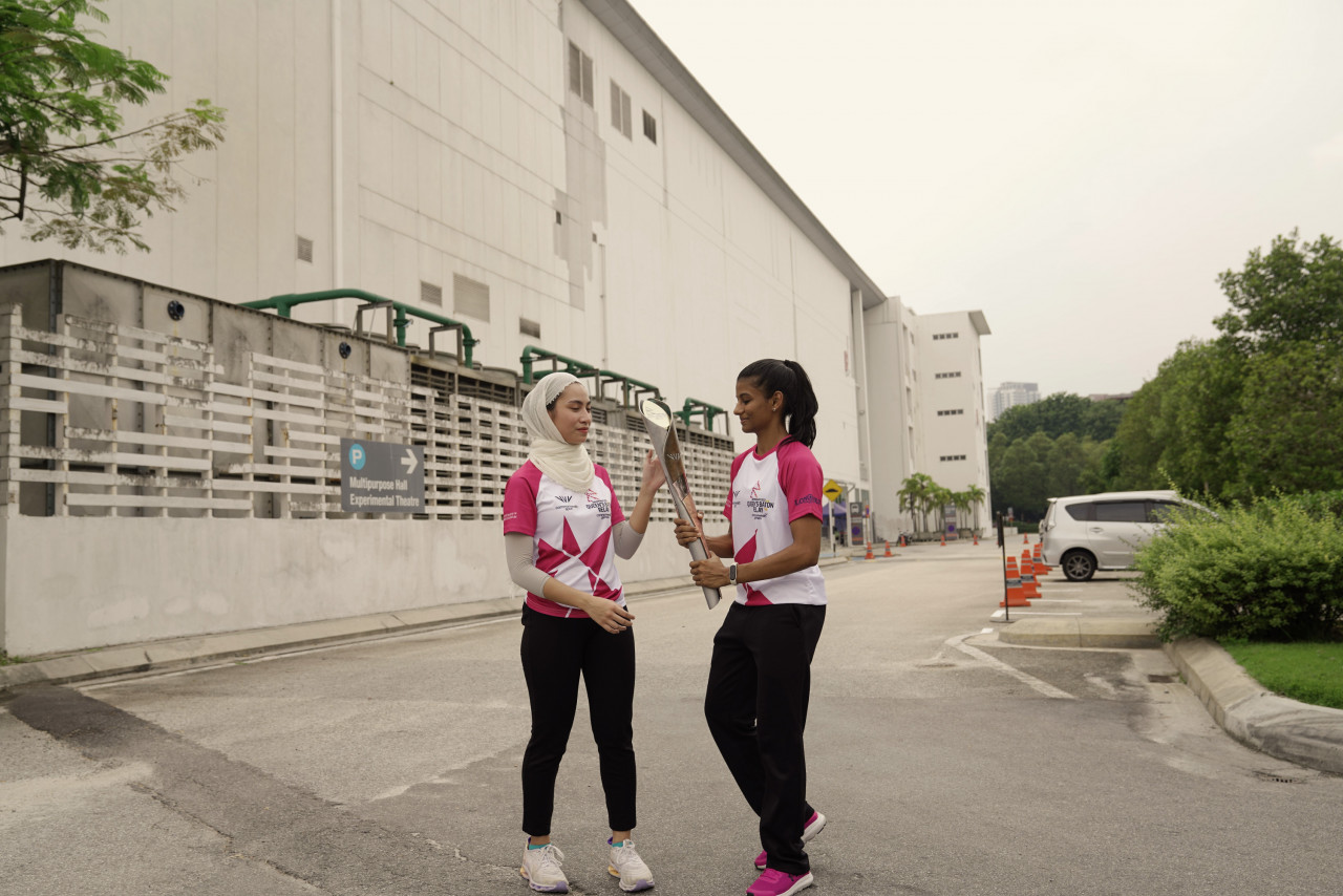 As one of the chosen Queen’s Baton runners, Shahmalarani Chandran (right), 24, feels her sacrifices over the years had borne fruit. – DHARSHINI GANESON/The Vibes pic, February 12, 2022