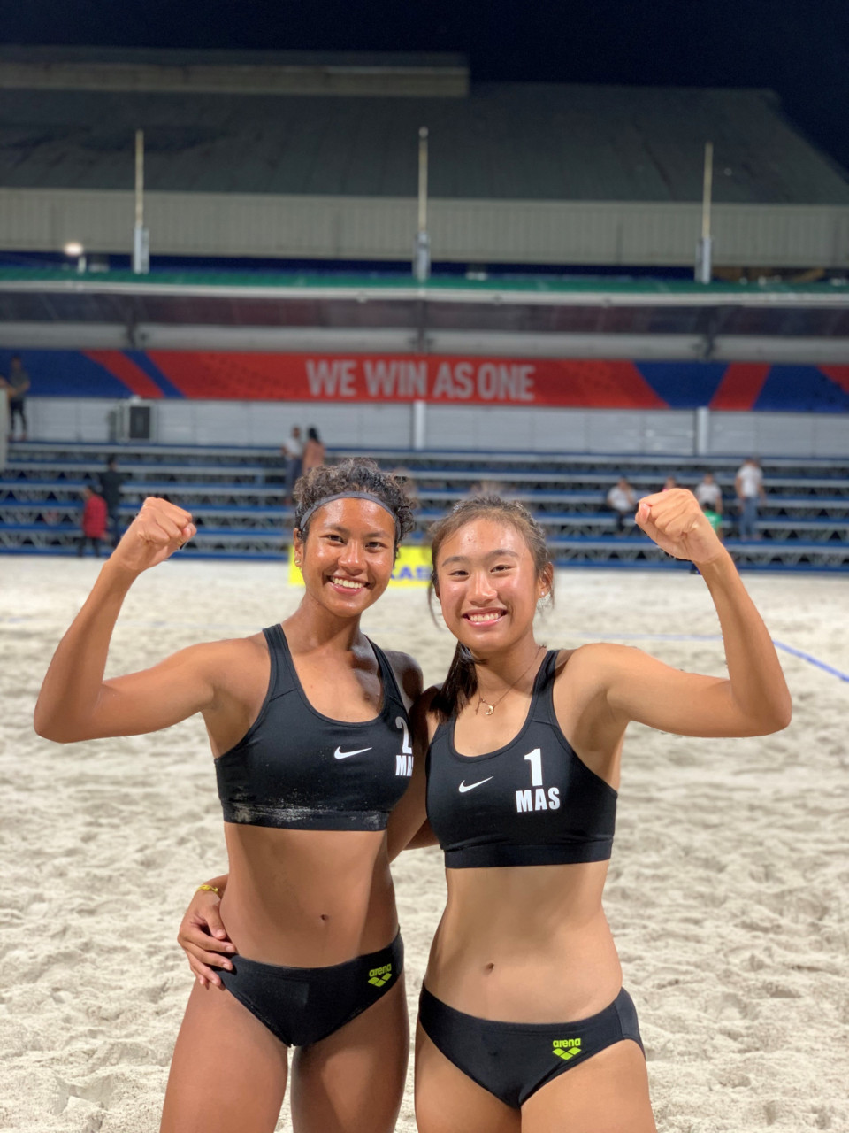 Tasha Mae (left), who is a national beach volleyball player and American Degree  Transfer Programme (Psychology) student at INTI International College Subang, is  excited about working with the national team to win a gold medal for Malaysia. Pic courtesy of INTI College
