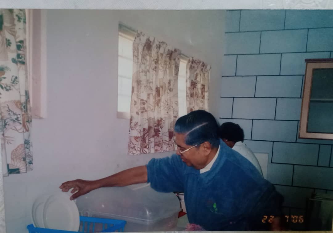Cardinal Soter Fernandez helps with the washing up after a luncheon. – October 31, 2020