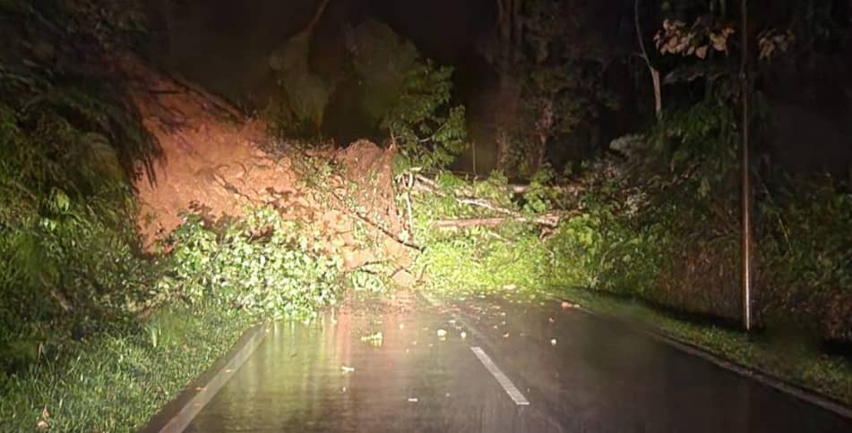 A 3am landslide blocked off both lanes of Jalan Mangkadait and was only cleared by Works Department personnel at about 10.30am, the Sabah Fire and Rescue Department says. – Social media pic, January 30, 2023