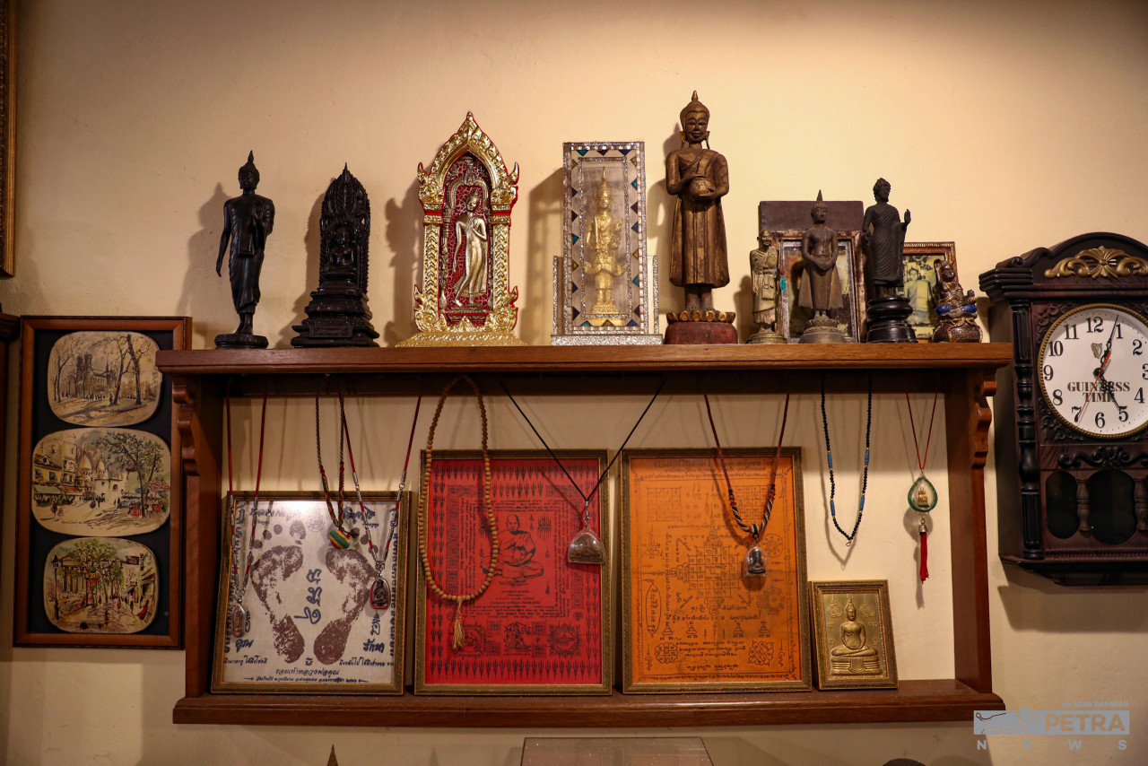 Some of Chong’s collection of Buddha statues and amulets displayed at his gallery that is under construction. – AZIM RAHMAN/The Vibes pic