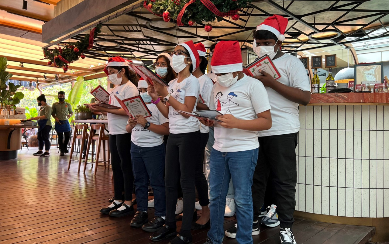 The Christmas carol ensemble at Roberto's 1020 Osteria, yesterday. – Pic courtesy of Petra Cuccina